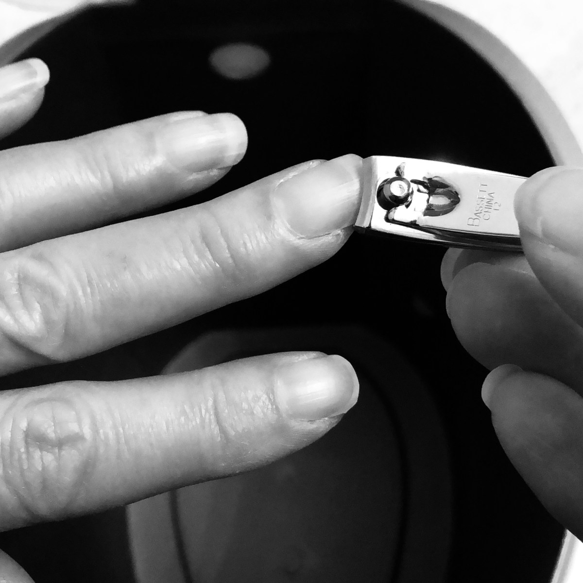 Photo of me clipping my fingernails